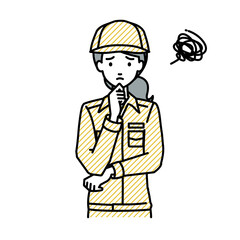 立って手をあごにあてて困っている作業員の女性