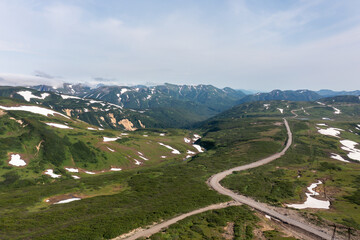 Fototapeta na wymiar Beautiful mountain landscape of Vilyuchinsky Pass at sunny day. Kamchatka Peninsula, Russia