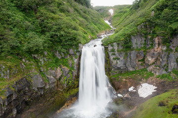 Obraz na płótnie Canvas The Calm Waterfall on Kamchatka Peninsula, Russia
