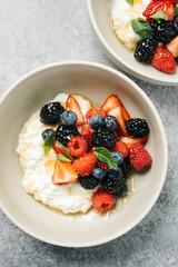 Fresh berries over ricotta cheese and honey
