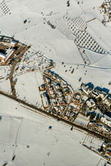 plains olive tree snow Madrid empty roads aerial view town