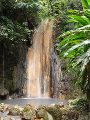 tropical waterfall with hot springs