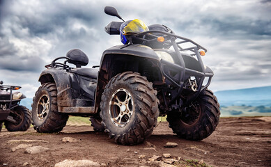 ATV quad bike on forest offroad, summer travel rally