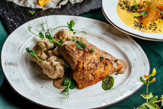 meat and vegetables on a plate. menu. top view