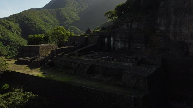 Front closeup of the jungle ruins of a former sanctuary for the elite Jaguar and Eagle warriors during the Aztec empire. The pyramid is located in Malinalco, Mexico, and is a stunning experience.