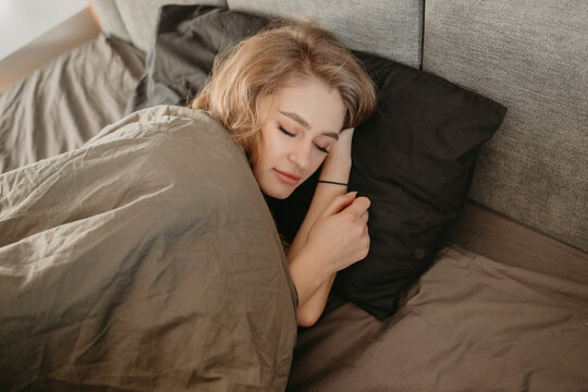beautiful girl sleeping in bed
