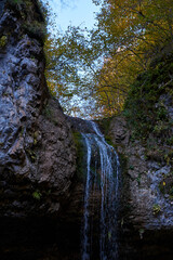 Image of a mountain waterfall.