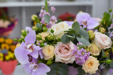 Beautiful fresh flowers. Bouquet of flowers in the store. Gift for a woman on March 8.