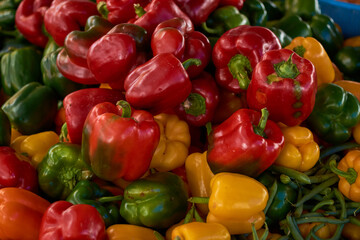 Fototapeta na wymiar Variation of colored peppers in the market.