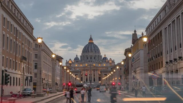 detailed day to night timelapse from the front of Vatican City with a busy street . Famous attraction located within Rome, Italy. cityscape Vaticano, Roma, Italia.