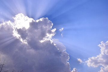 Sun rays emanating from the clouds, beautiful view of the sky