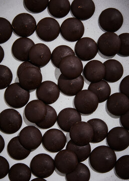 dark chocolate buttons close up