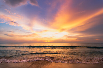 Fototapeta na wymiar A colorful seascape with a vivid sky background