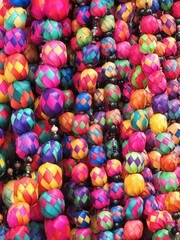 traditional Mexican straw decorations in a market