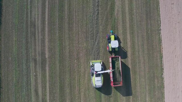 Close up of Agricultural machinery, tractors and harvesters
Rural landscape. An new tractor on field. Shooting from a drone. 