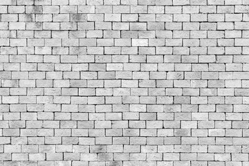 Wall white brick wall texture background. Brickwork or stonework flooring interior rock old pattern clean concrete grid uneven bricks design stack walls