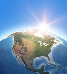 Fototapeta premium Sun shining over Planet Earth. Physical map of North America, USA, Canada, Alaska ans Greenland. 3D illustration - Elements of this image furnished by NASA