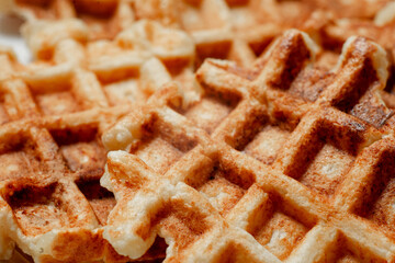 Belgian waffles close-up background. Home made.