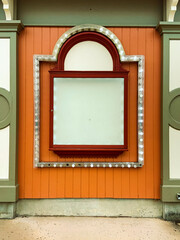 Empty sign on old theater, surrounded by lights, some broken. Room for copy space on sign.  