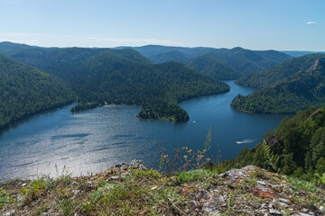 Fototapeta na wymiar Biryusinsky Bay in summer from the top of the mountain