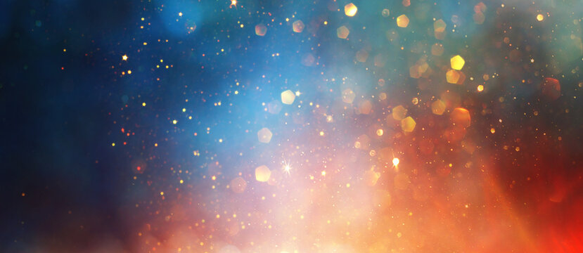 background of abstract gold and blue glitter lights. defocused