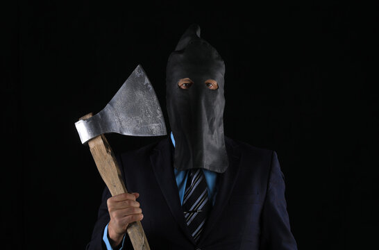 studio portrait of businessman executioner