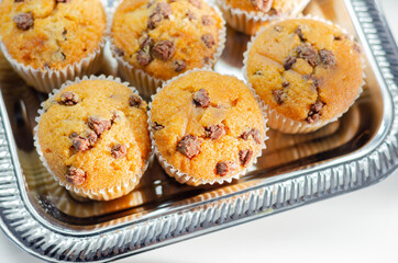 Delicious vanilla muffin cupcakes with chocolate chip, freshly baked mini pastries