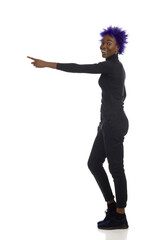 Happy Young Black Woman Is Standing And Directing. Full Length, Isolated.
