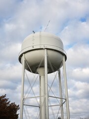 Water tower with droopy antenna on top