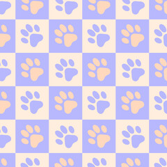 Fototapeta na wymiar Vector seamless pattern of traces of cat paws on a chessboard. Lilac, violet, yellow, orange colors. For textiles, wrapping paper, napkins, backgrounds.
