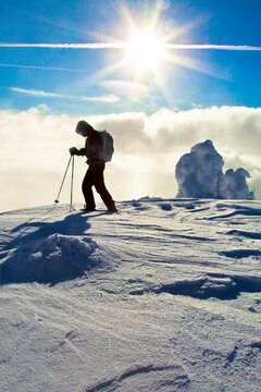 Man ski touring on a sunny day near Whistler, B.C., Canada.