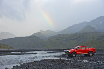 modified pick up truck driving on the Icelandic highlands
