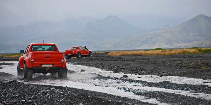 modified pick up truck driving on the Icelandic highlands
