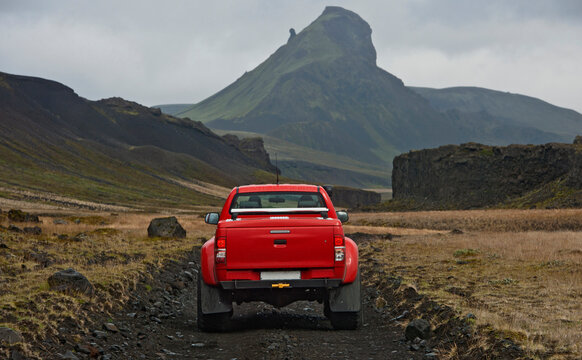 modified pick up truck driving on the Icelandic highlands