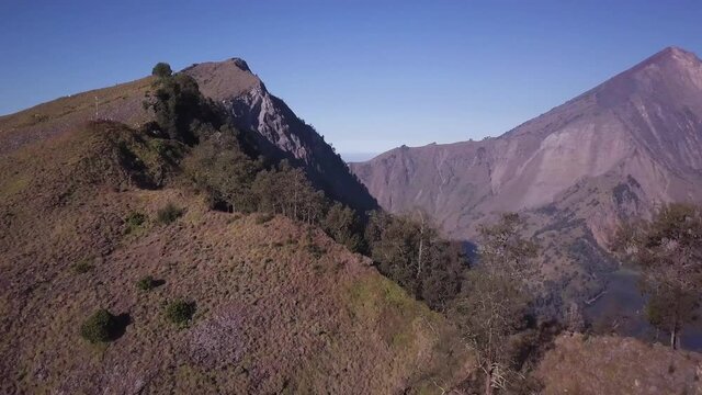 Aerial view of our Base camp of tent camping site at Pelawangan Sembalun towards Rinjani mountain in Lombok island, Indonesia.