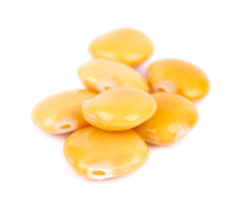 Pickled yellow lupine beans isolated on white background. Tournus, preserved lupinus.
