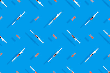 Medical syringes seamless pattern. Background on the theme of medicine, vaccination and human health.