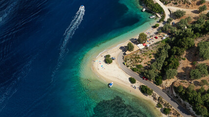 Fototapeta na wymiar Aerial drone photo of paradise turquoise beach of Amoglossa meaning a sand tongue with crystal clear sea, Ionain, Greece