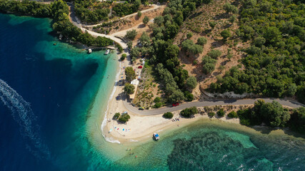 Aerial drone photo of paradise turquoise beach of Amoglossa meaning a sand tongue with crystal...