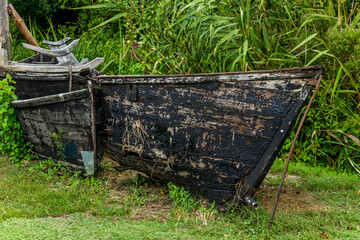 damaged wooden boats