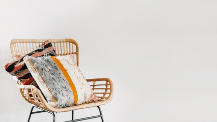 Fototapeta na wymiar Bamboo chair in living room with boho interior design