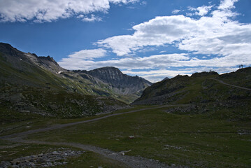 Hiking in Mölltaler Glacier area, high mountains, glacier, waterdams and cows on pastures 