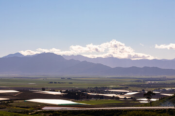 General view of countryside landscape with cloudy sky