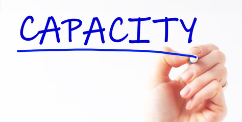 hand writing inscription capacity with marker, concept, stock image