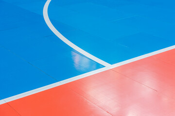 Blue and orange floor volleyball, basketball, badminton, futsal, handball court. Wooden floor of...