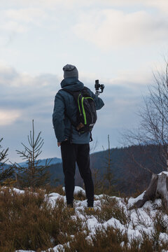 photographer I know uses a gimbal on his phone to get a better video image. Shooting videos in winter Czech nature. Vlogging live