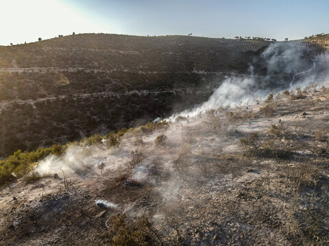 Jindires, Syria - September 14, 2021: Fires erupt in the mountainous forests in the village of Jindires in the countryside of Afrin on the Syrian-Turkish border