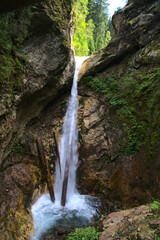 Obraz premium Raggaschlucht waterfall area with scenic pathways