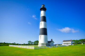 A nice summer landscape of the Bodie Island Lighthouse under a blue sky on the Outer Banks in North...