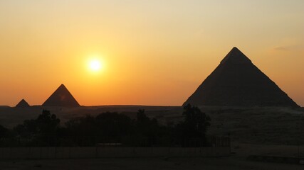Fototapeta na wymiar pyramids of giza at sunset